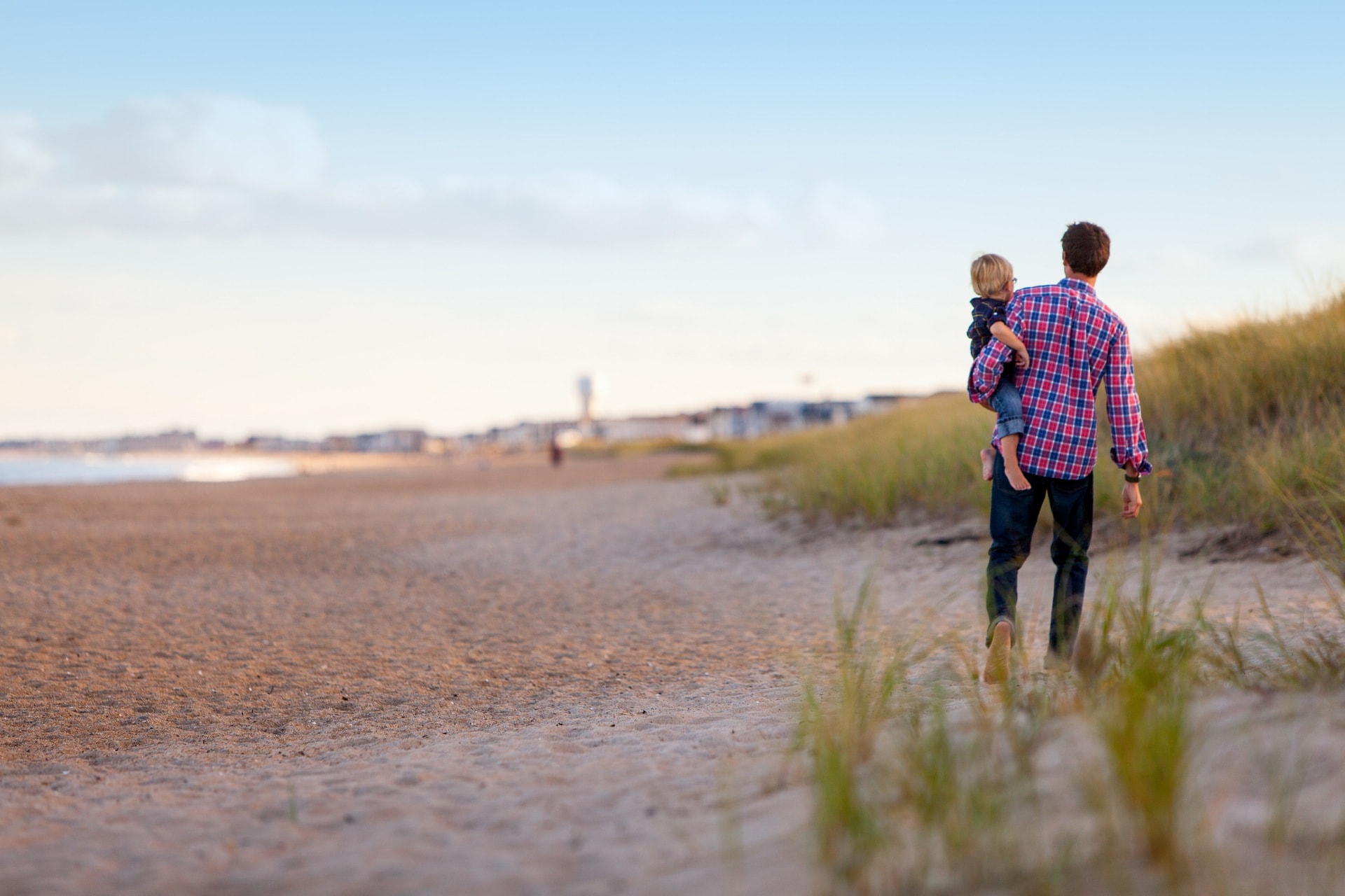 Father and son on beach